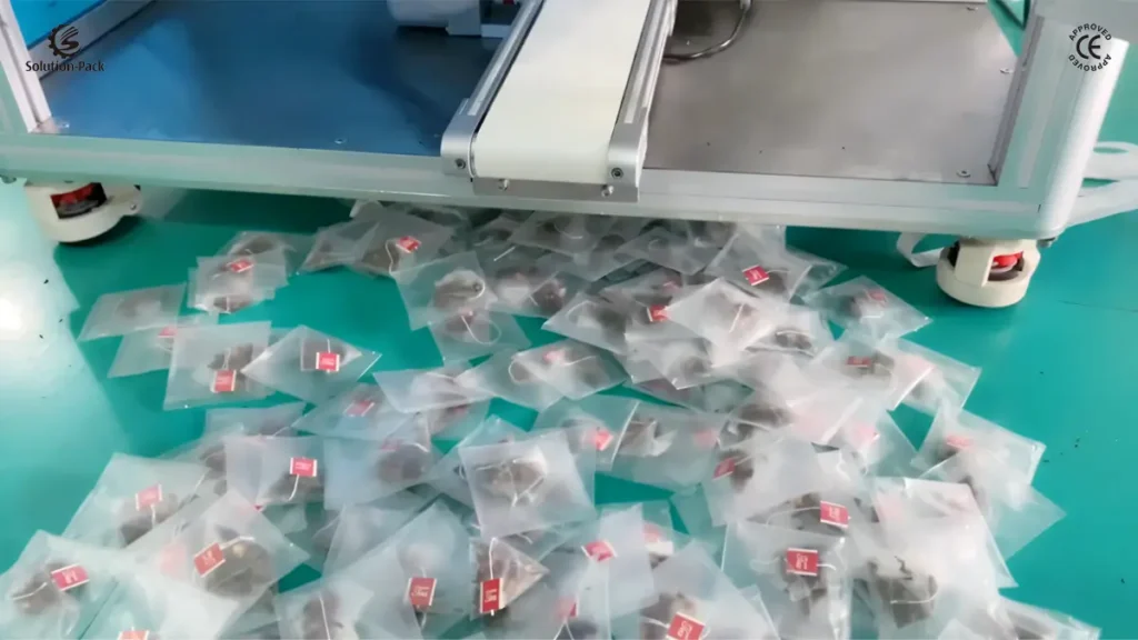 Vertical Pyramid Teabag Packaging Machine | Solution-Pack | Model ATB-PD40 | Outer Sachet Output System