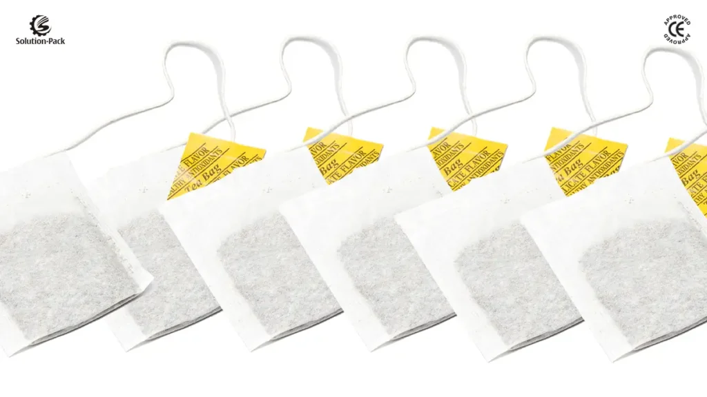 Economic Filter Paper Teabag Packaging Machine | Model ATB-S1 | Solution-Pack | Teabag Machine | Teabag with Thread and Tag